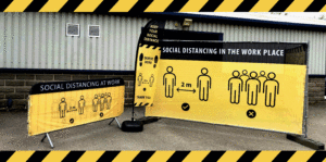 social distancing banners, flags and heras fence panels
