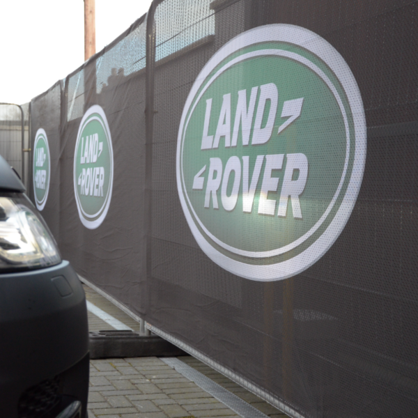 land rover print heras fence banners using airmesh fence scrim